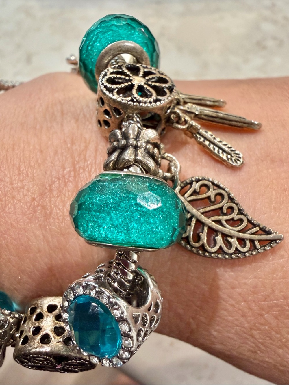 Silver charm bracelet with removable turquoise glass beads & Charms
